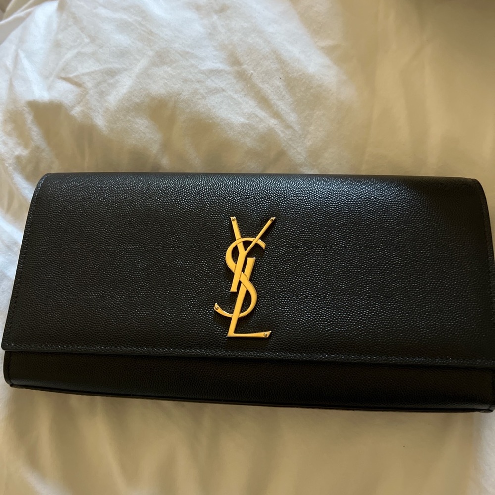 AUTHENTIC YSL clutch brand new FIRM ON PRICE.